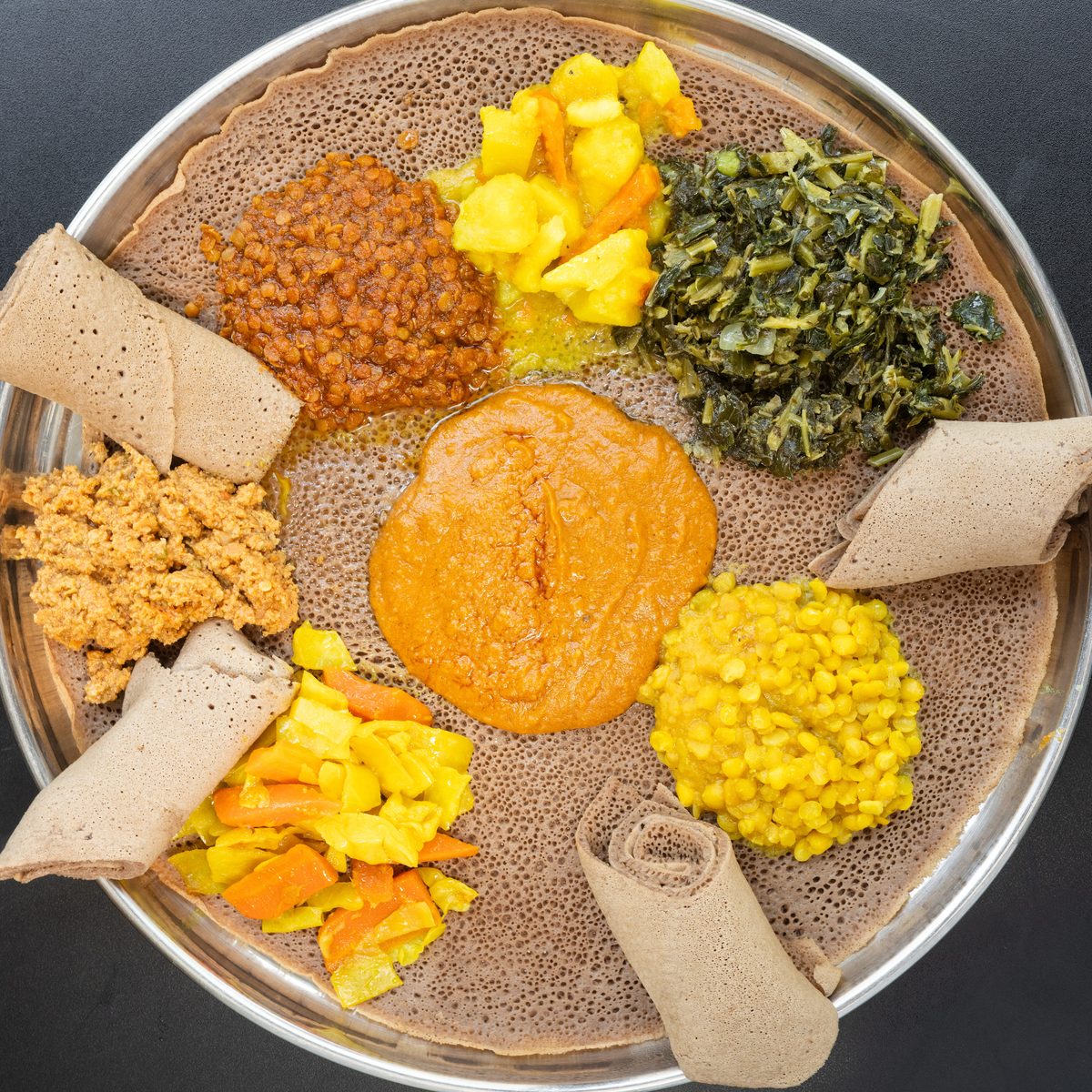 Tear the Injera. Eat Together.